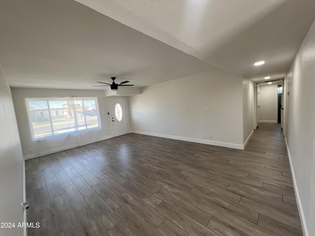 1737 N Trevor Dr, Mesa, AZ 85201 - empty room with dark wood-style flooring, baseboards, and a ceiling fan