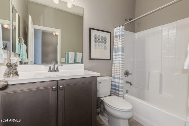 full bath with vanity, toilet, and shower / bathtub combination with curtain