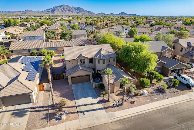 bird's eye view with a mountain view and a residential view