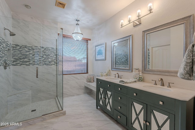 full bath with a sink, a stall shower, and visible vents