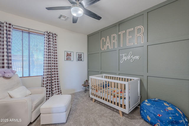 bedroom featuring carpet floors, ceiling fan, and visible vents