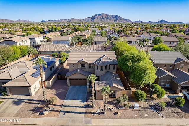 birds eye view of property with a residential view and a mountain view
