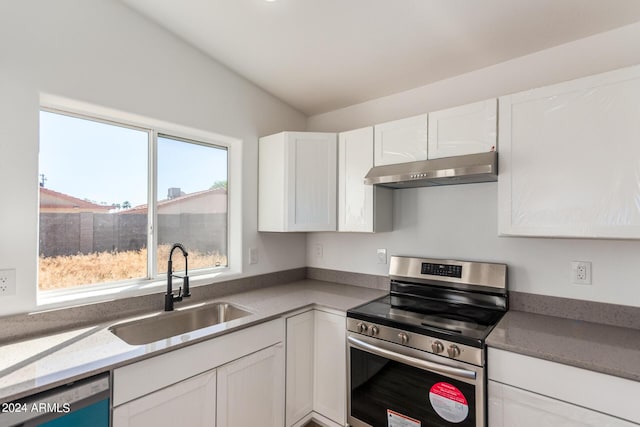 kitchen with dishwashing machine, a sink, stainless steel range with electric stovetop, under cabinet range hood, and white cabinetry