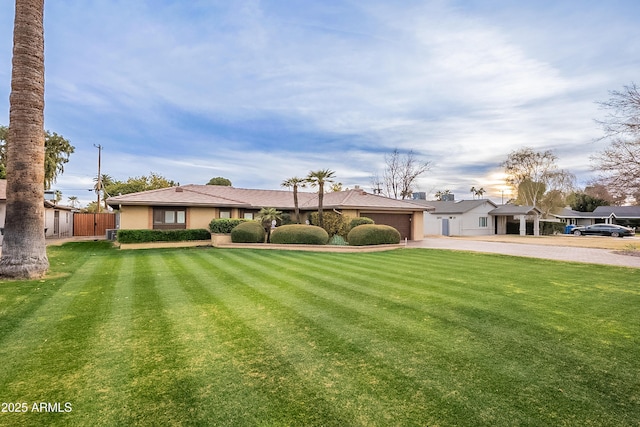 single story home with a front yard