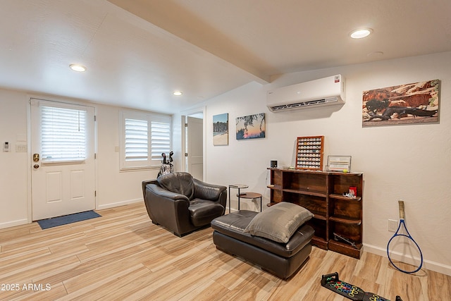 living room with a wall mounted air conditioner, light hardwood / wood-style floors, and vaulted ceiling with beams