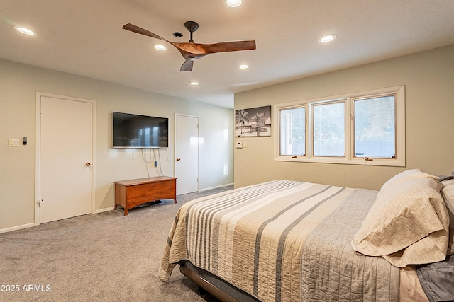 carpeted bedroom with ceiling fan