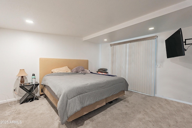 bedroom with light carpet