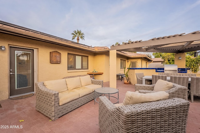 view of patio with an outdoor kitchen and an outdoor living space