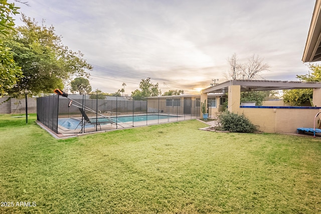 view of yard featuring a fenced in pool