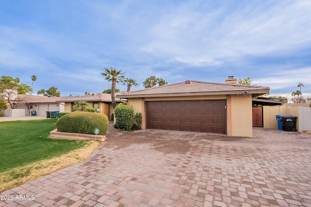 ranch-style house with a front lawn