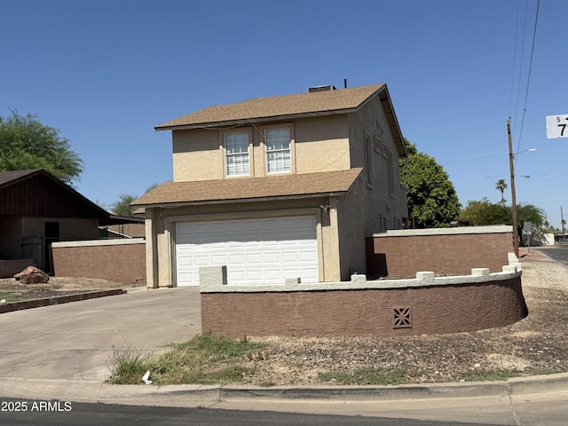 8602 S 7th Pl, Phoenix, AZ 85042 - traditional-style house with stucco siding, driveway, and a garage