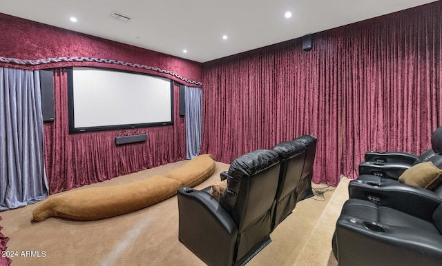 home theater featuring light colored carpet