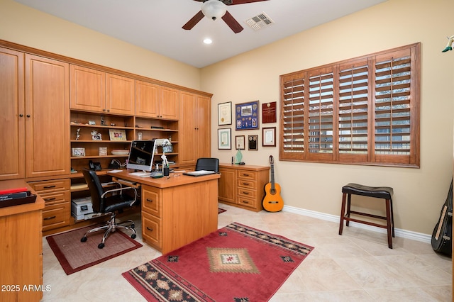 tiled office space with ceiling fan