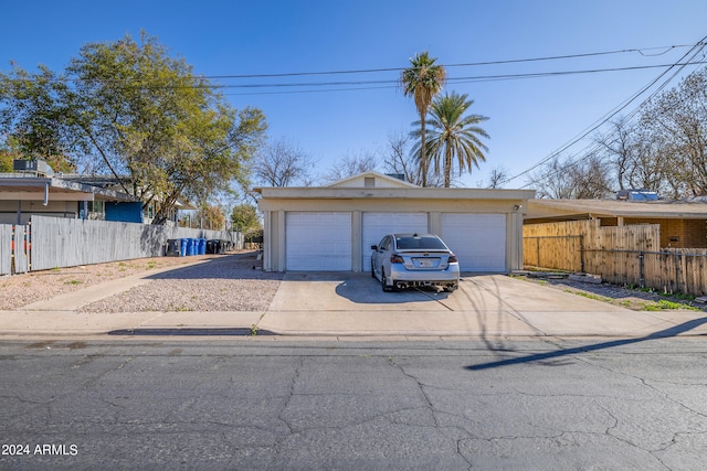 single story home featuring a garage