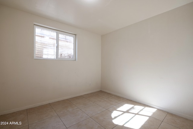 view of tiled empty room