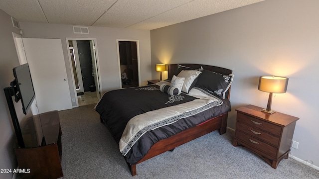 bedroom featuring light colored carpet