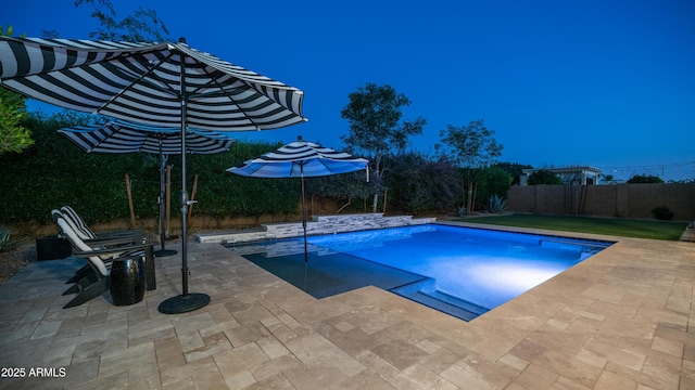 view of pool featuring a fenced in pool, a patio area, and a fenced backyard