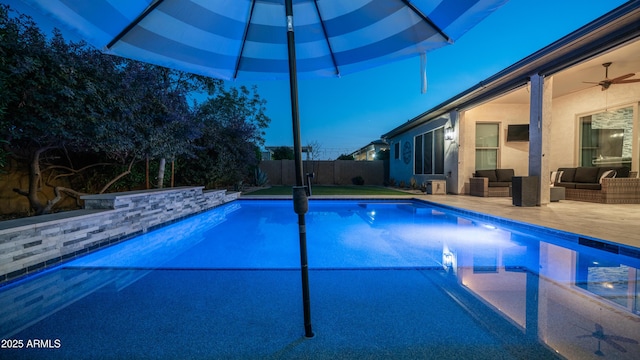 view of swimming pool featuring a fenced in pool, a patio, outdoor lounge area, a ceiling fan, and a fenced backyard