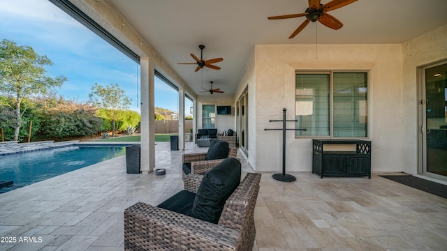 view of patio / terrace with fence, outdoor lounge area, and a fenced in pool