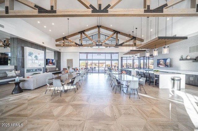 dining area featuring high vaulted ceiling, recessed lighting, visible vents, beam ceiling, and an inviting chandelier