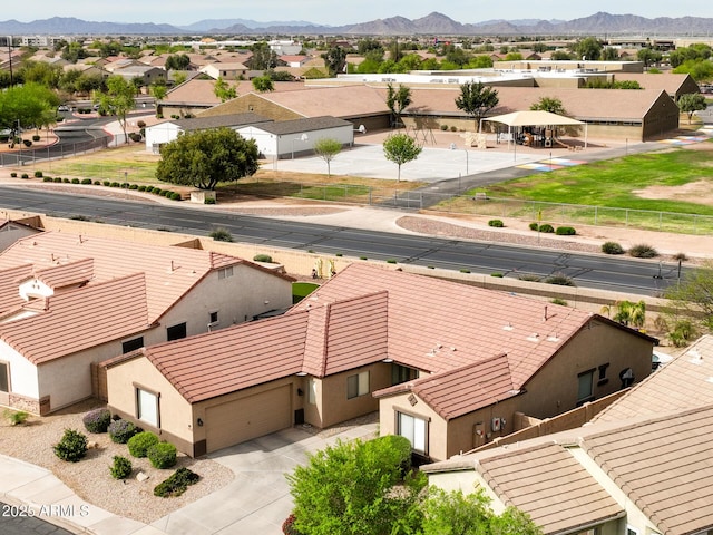 aerial view featuring a mountain view and a residential view