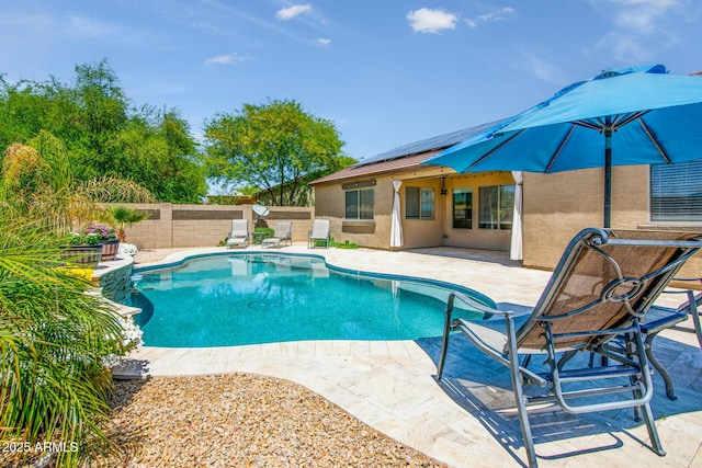 view of swimming pool featuring a patio, a fenced backyard, and a fenced in pool