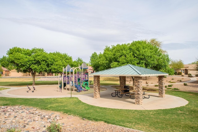 community jungle gym with a yard and a gazebo