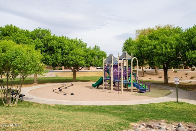 community playground featuring a yard