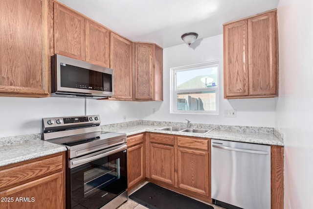 kitchen featuring stainless steel appliances and sink