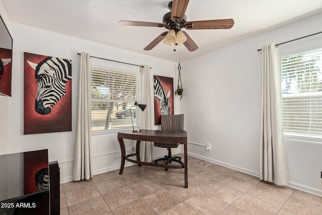 tiled office space with ceiling fan