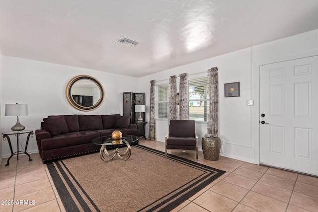 living room with light tile patterned floors