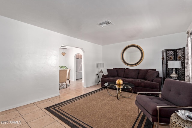 living room with light tile patterned floors