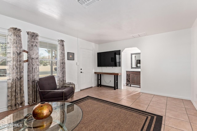 living room with light tile patterned floors