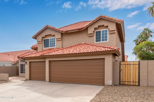 mediterranean / spanish house featuring a garage