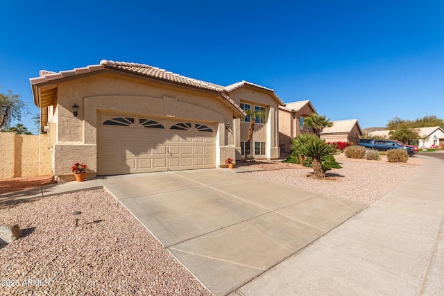 view of front of house with a garage