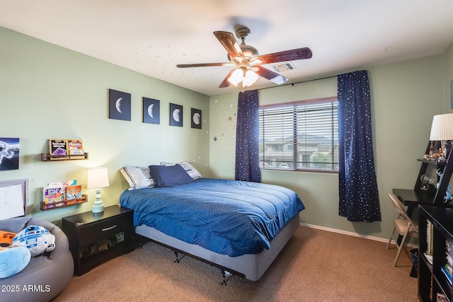 bedroom featuring baseboards, carpet, visible vents, and a ceiling fan