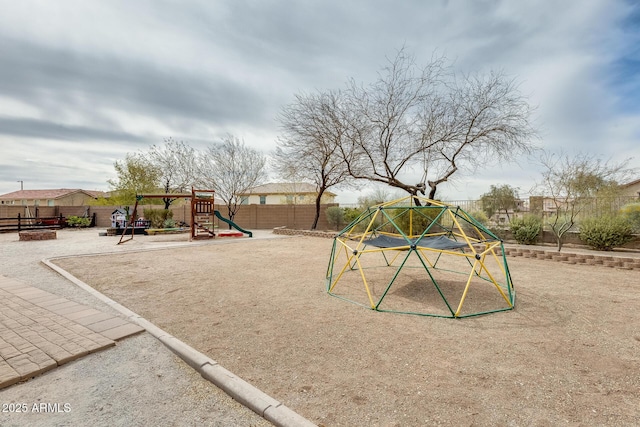 view of playground with a fenced backyard