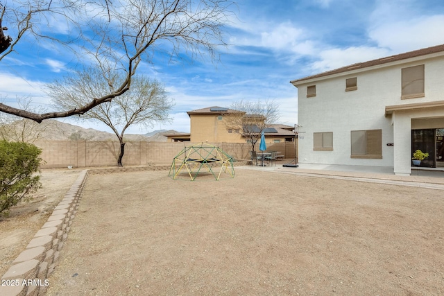 view of yard featuring a fenced backyard and a patio