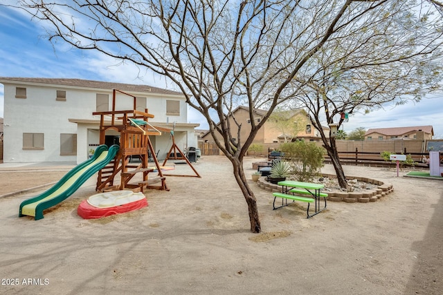 view of play area featuring fence