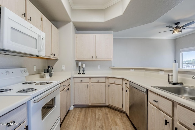 kitchen featuring light countertops, crown molding, light wood-type flooring, white appliances, and a ceiling fan