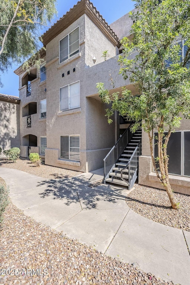 exterior space featuring stairs