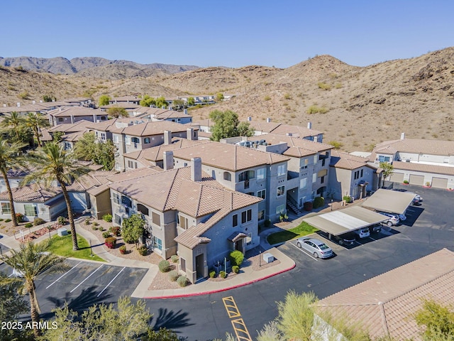 birds eye view of property featuring a residential view and a mountain view