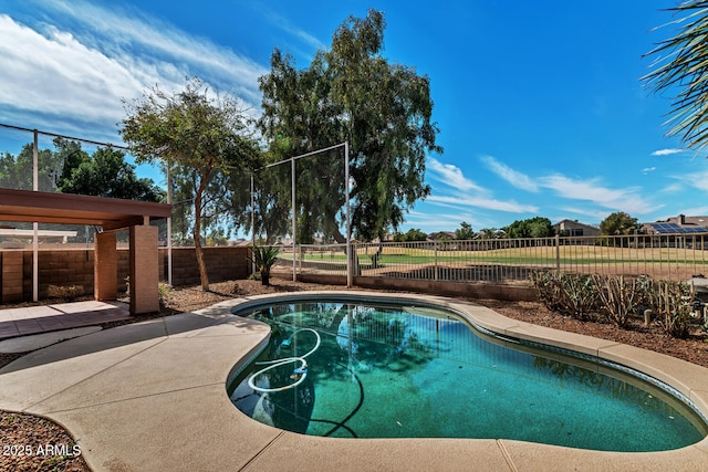 view of swimming pool with a patio area, a fenced backyard, and a fenced in pool