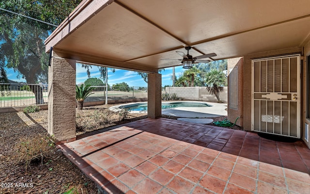 view of patio with a fenced backyard, a ceiling fan, and a fenced in pool