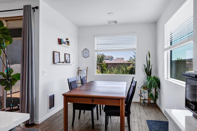6145 S Adelle, Mesa, AZ 85212 - dining space featuring light wood-style floors and baseboards