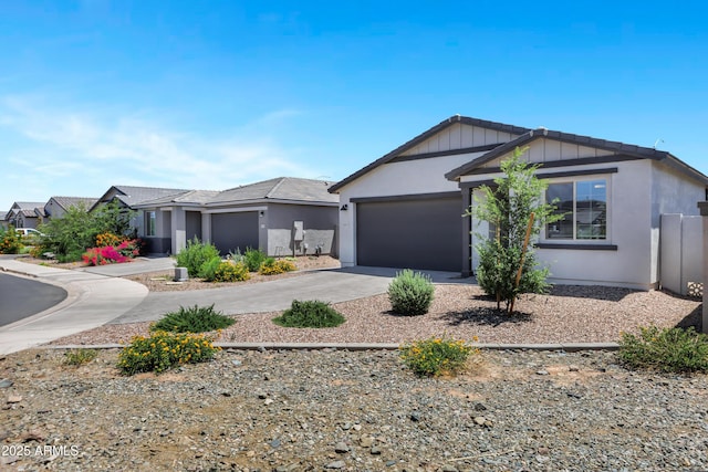 6145 S Adelle, Mesa, AZ 85212 - ranch-style house featuring driveway, an attached garage, and stucco siding