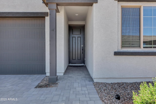 6145 S Adelle, Mesa, AZ 85212 - property entrance with stucco siding and an attached garage