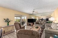 living room with ceiling fan