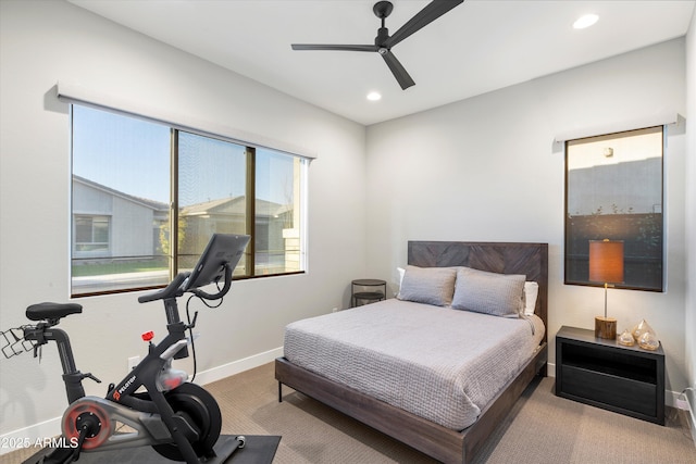 bedroom with light carpet, recessed lighting, a ceiling fan, and baseboards