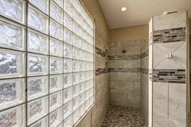 bathroom with recessed lighting and walk in shower